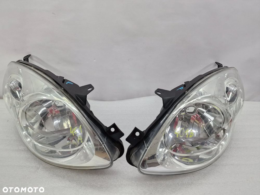 RENAULT TWINGO 2 II 07-12 LEWA / PRAWA LAMPA PRZEDNIA PRZÓD JASNA , NR AUKCJI LA401 - 1