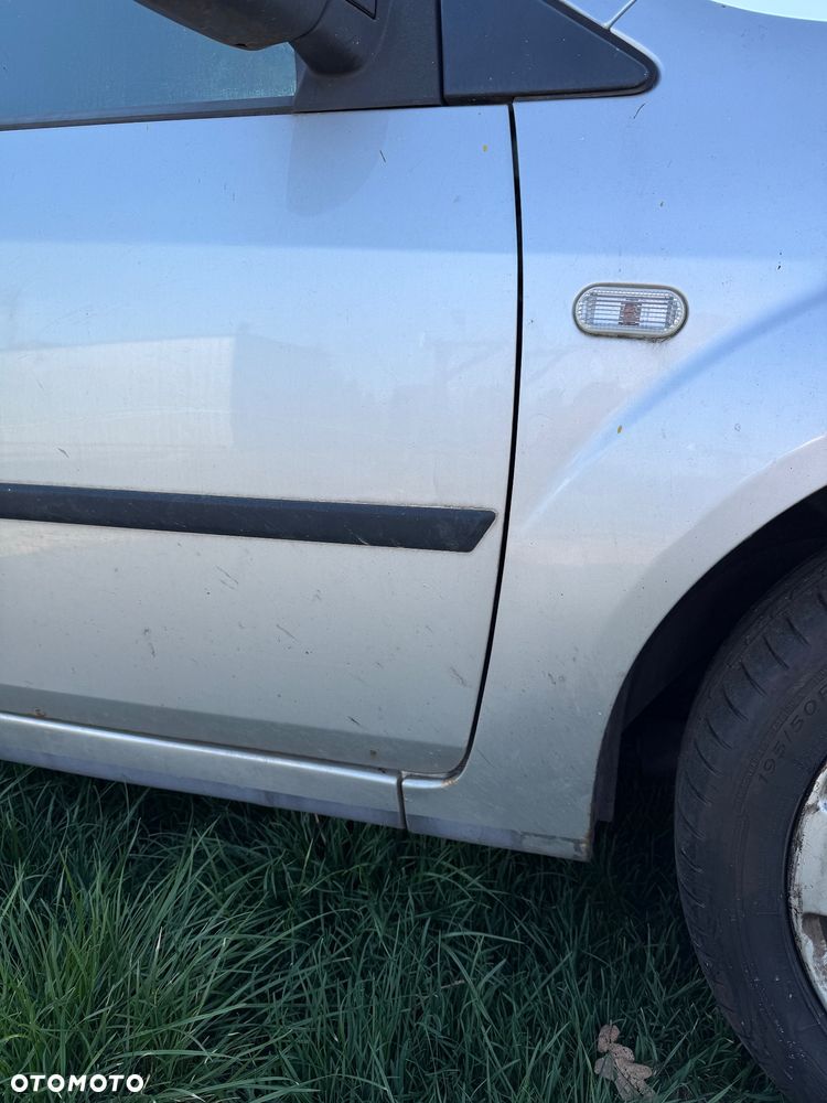 Ford Fiesta 1.4 Ghia - 9