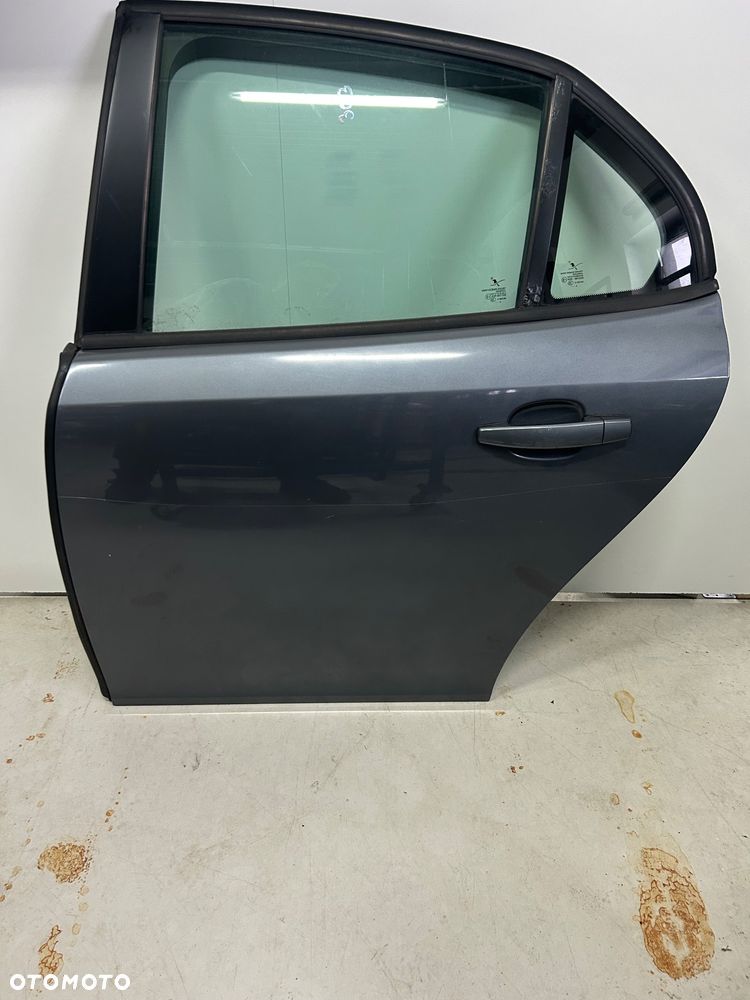 Saab 93 9-3 drzwi tylne  lewe tył tylne  kolor 303 lift 2008-2011 - 1