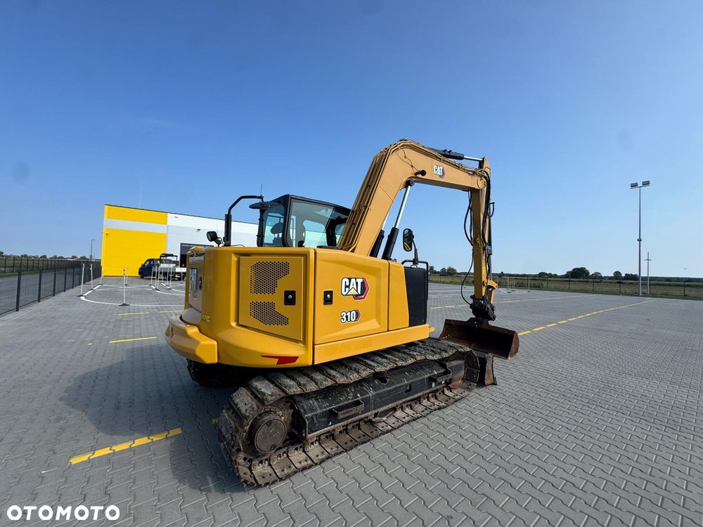 Caterpillar 310 - 3