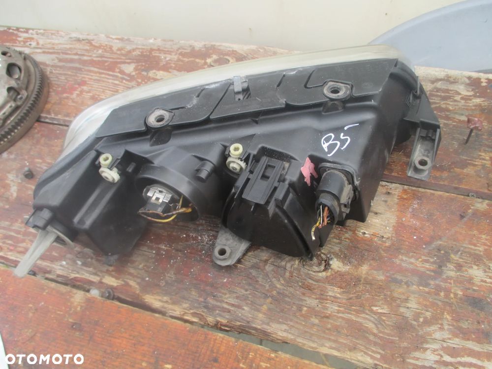 lampa lewa VW Passat B5 LIFT Hella Europa - 7