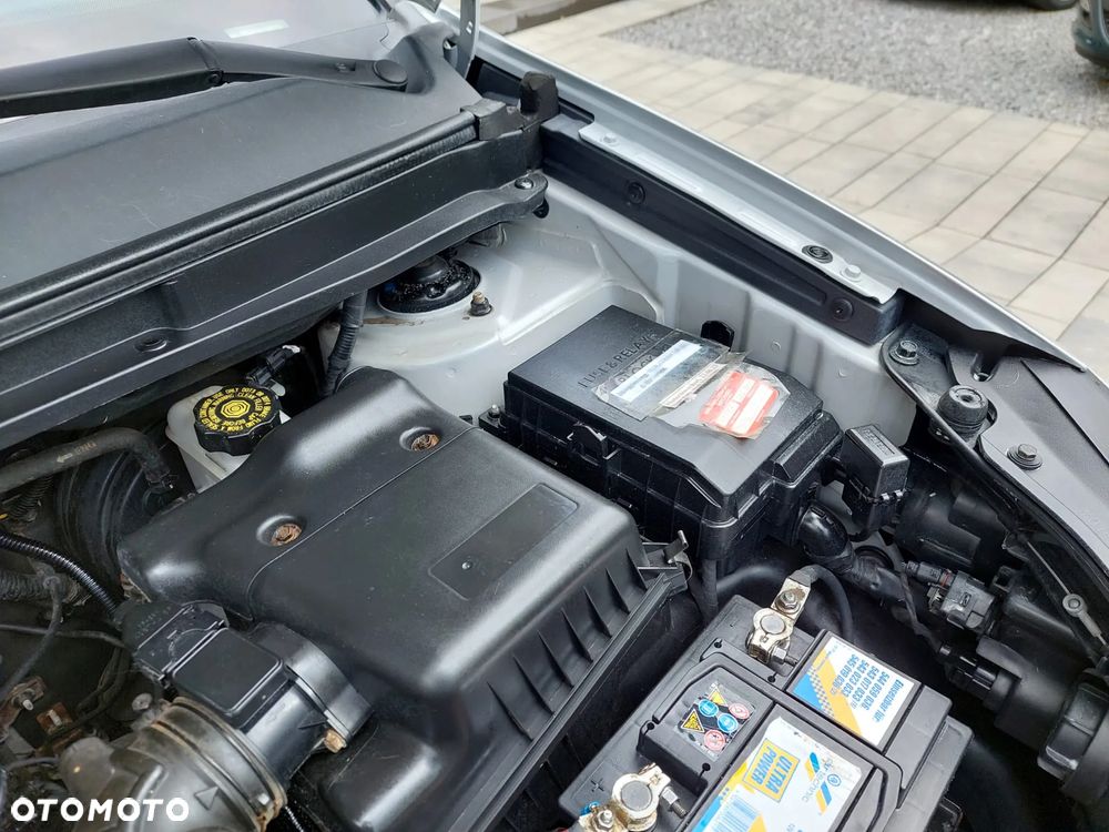Kia Carens 2.0 CVVT EX - 34