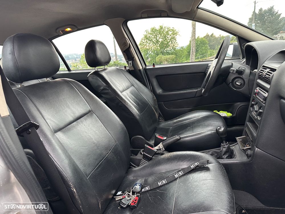 Opel Astra 1.4i 16V Sport - 12