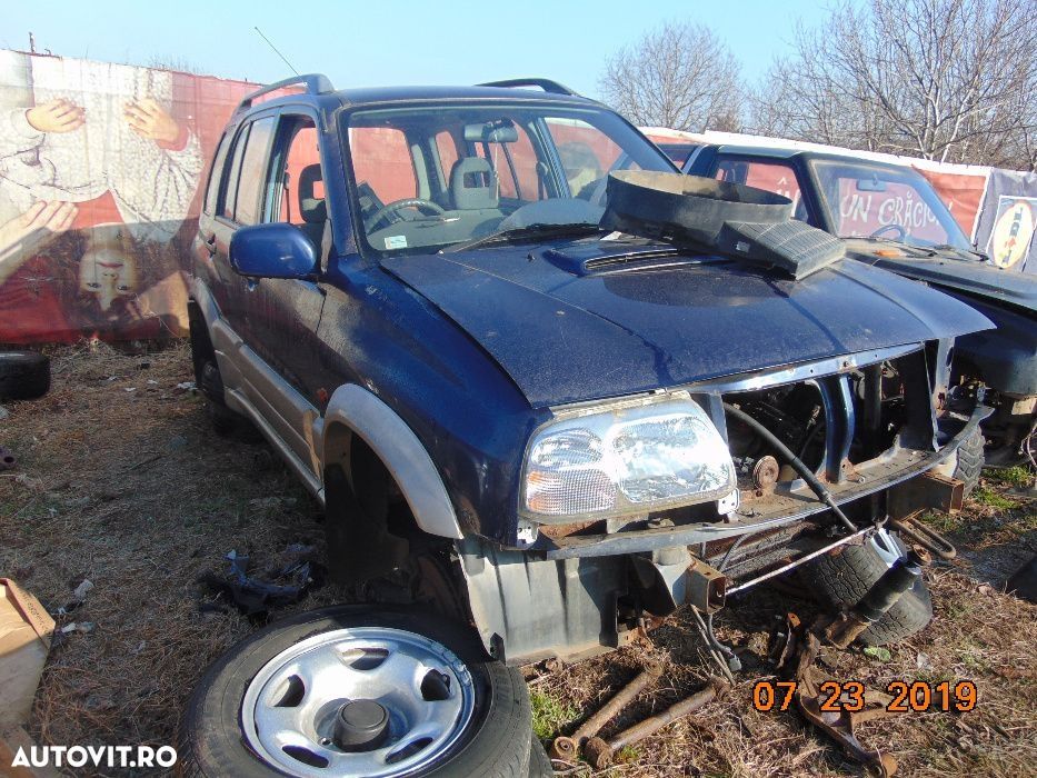 Dezmembrez Suzuki Grand Vitara 2.0hdi cutie motor planetara usa far - 1