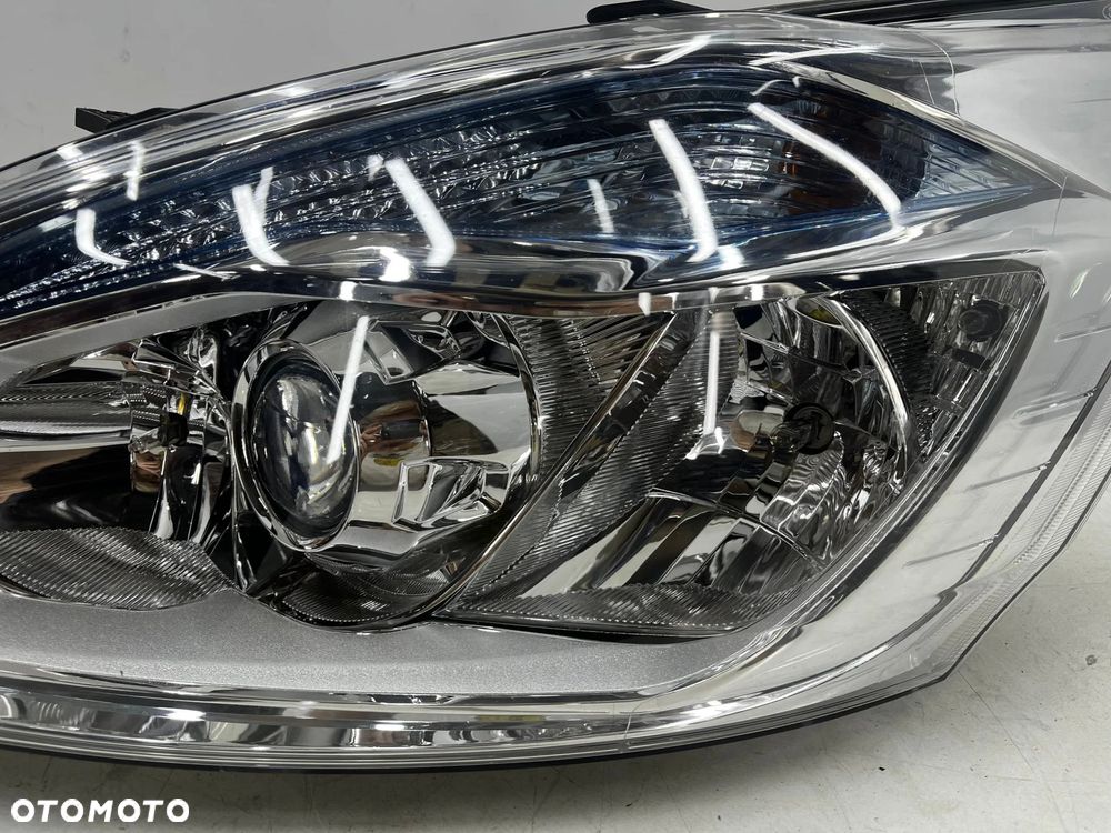 Lampa reflektor Ford Transit Custom MK1 13-17r. EU lewa przednia soczewka z doświetlaniem zakrętów E - 7