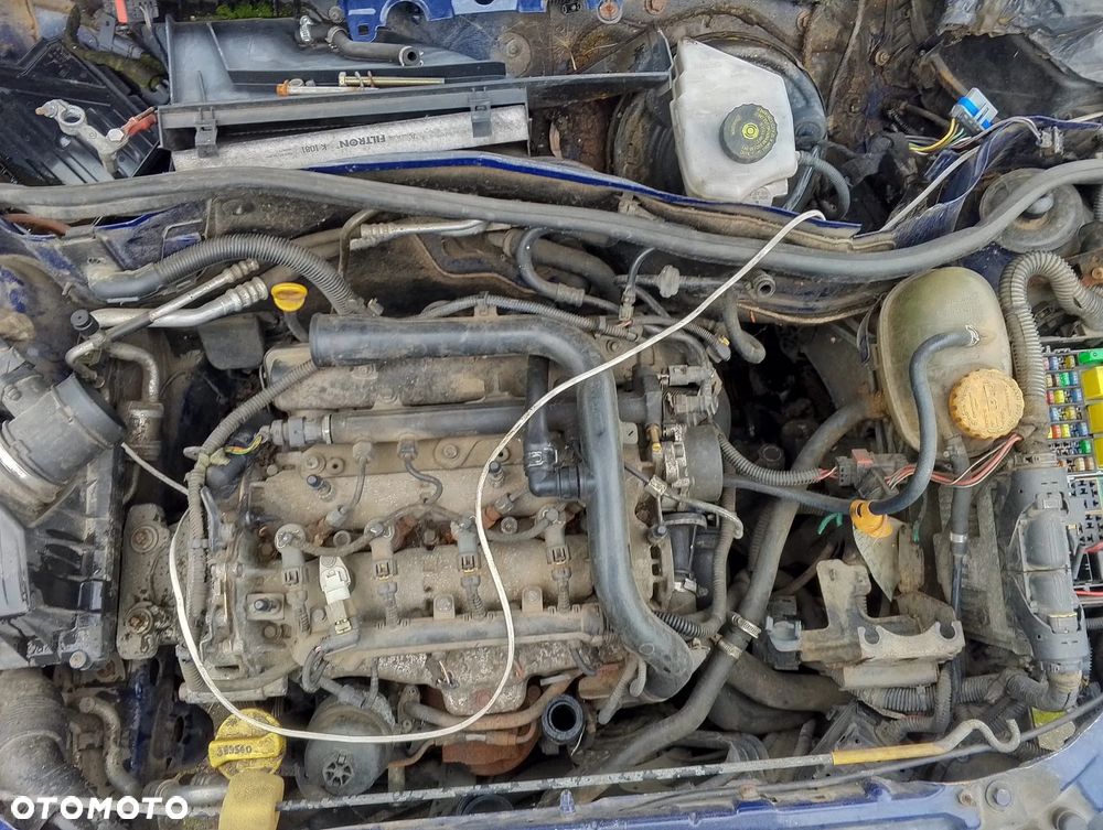 Opel Combo C (03-11r.) 1.3D 69KM. Silnik Y13DT Skrzynia M26 lakier 4DU. Cały na części GWARANCJA!!!!  Przód Tył Zestaw Komplet Drzwi Klapa Zderzak Błotnik Maska Grill Atrapa Szyba Pas Lampa Lusterko Boczki Fotel Kanapa Kokpit Deska Rozdzielcza Przełącznik Włącznik Sterownik Przewody Wiązka Instalacja Moduł Komputer Czujnik Listwa Pompa Alternator Wtryski Głowica Rozrusznik Kompresor Sprzęgło Dwumas Silnik Skrzynia ABS Klimatyzacji Paliwa Wspomagania Kolektor Turbina Przepustnica Zawór Chłodnica Koło Hak Belka Sanki Zawieszenie Mcpherson Półoś Amortyzator Wydech Tłumik Zacisk Most - 8