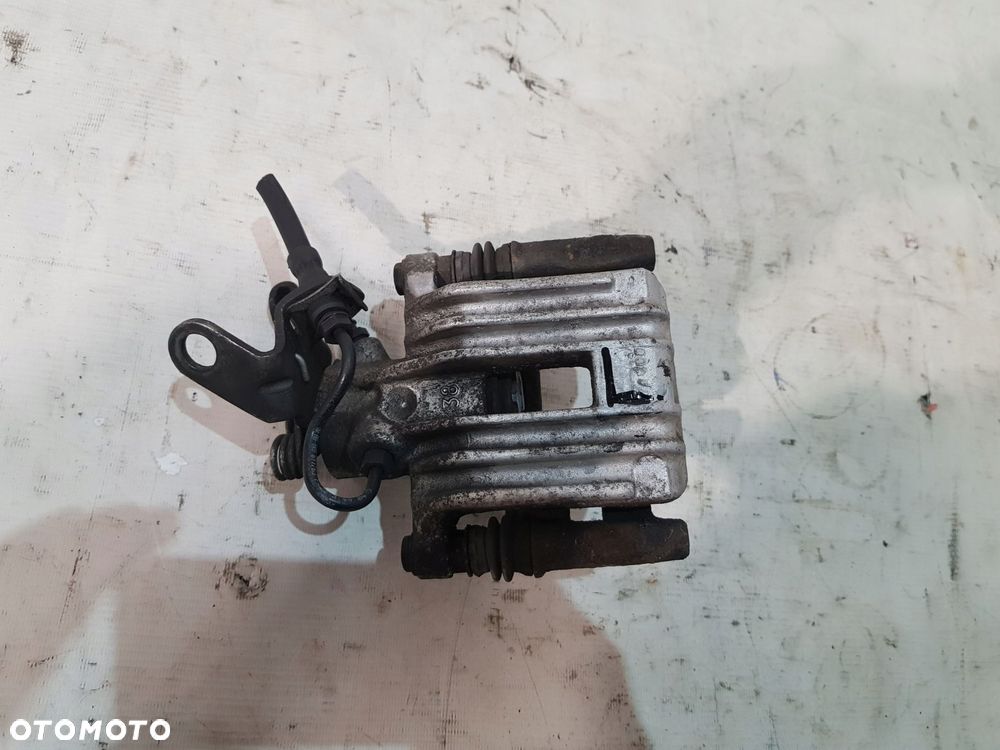 zacisk hamulcowy lewy tył vw audi skoda eu - 1