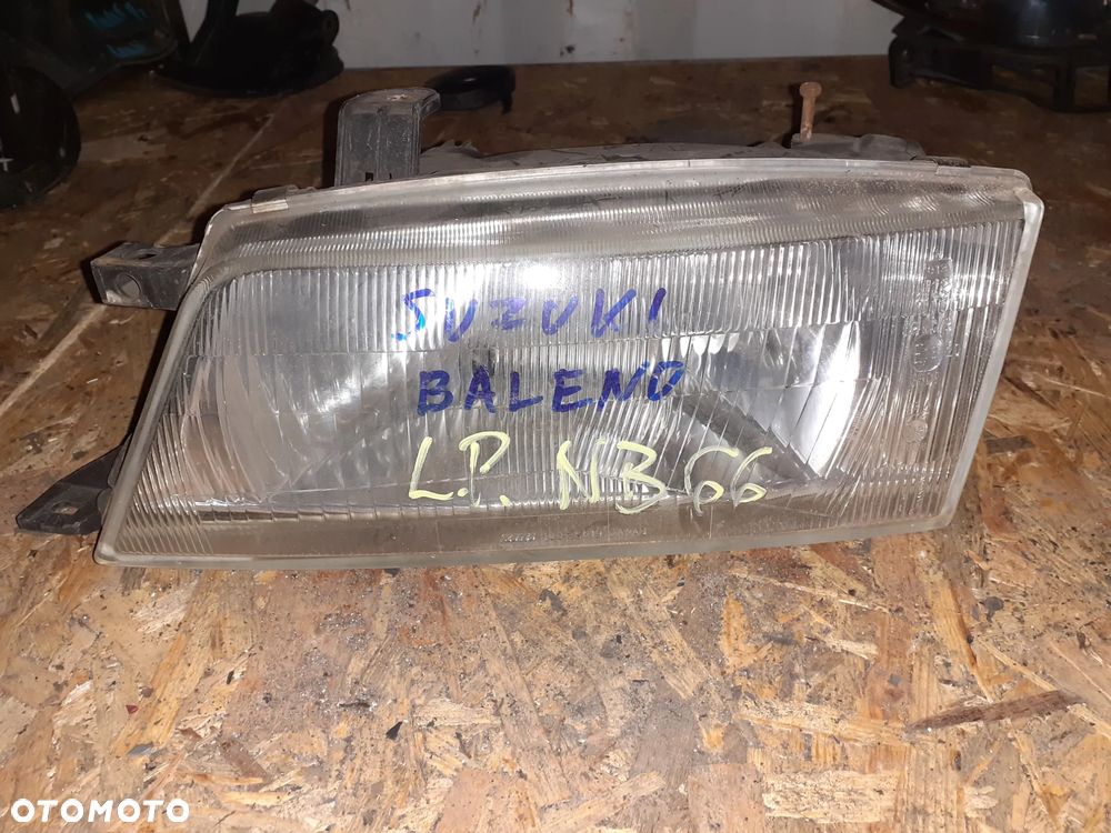 Reflektor LAMPA LEWA LEWY PRZÓD SUZUKI BALENO