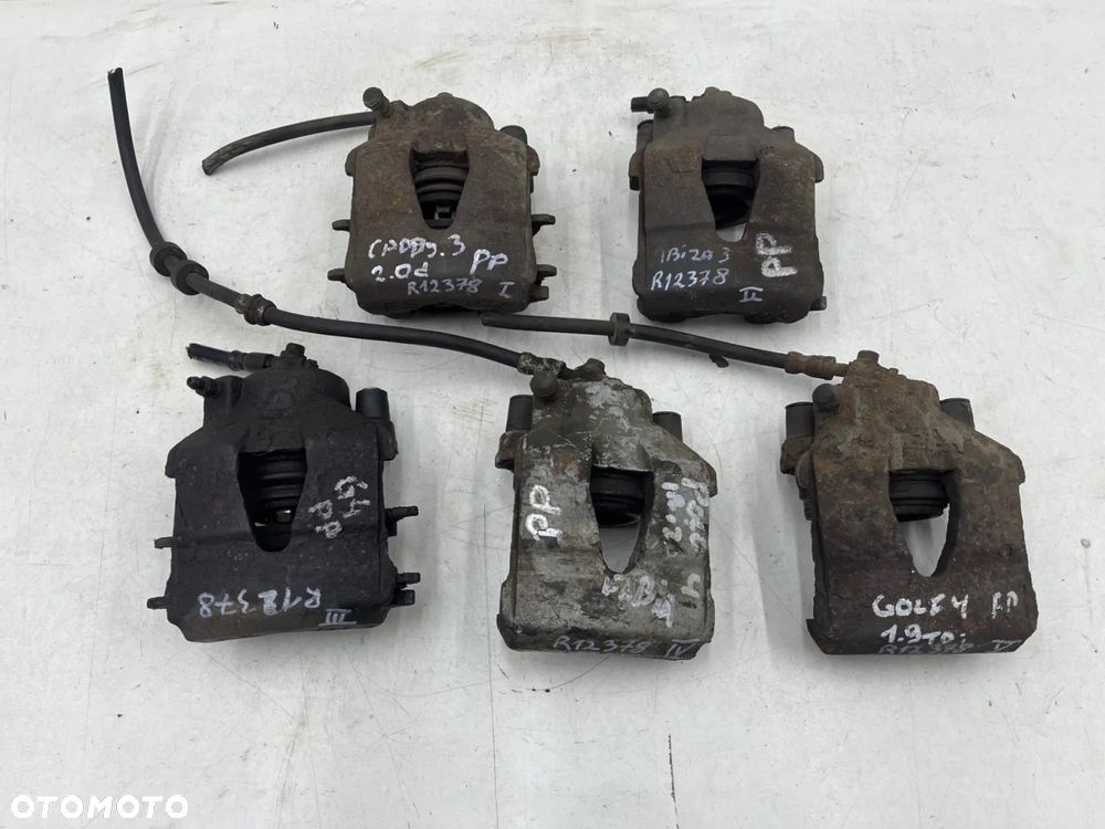 Zacisk hamulcowy VW Golf IV V VI Polo III IV Audi A3 8l 8p Leon I II Ibiza III IV Fabia I II III Octavia I II Caddy III 97-12r. prawy przedni jarzmo - 1