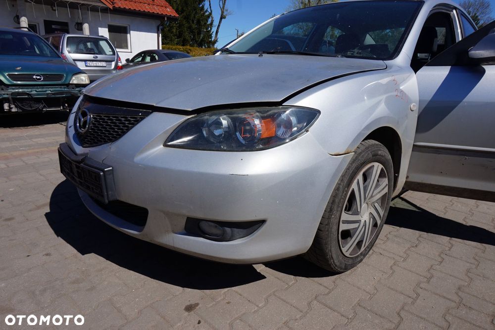 MASKA ZDERZAK BŁOTNIKI LAMPY 3 I BK 22V  MAZDA 2003-2006 SREBRNY PRZÓD KOMPLETNY - 22