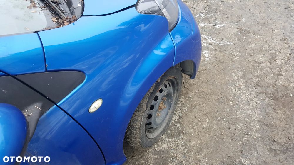 BŁOTNIK PRAWY PRZÓD PRZEDNI TOYOTA AYGO I LIFT 12-14 LAK. 8U7 - 2