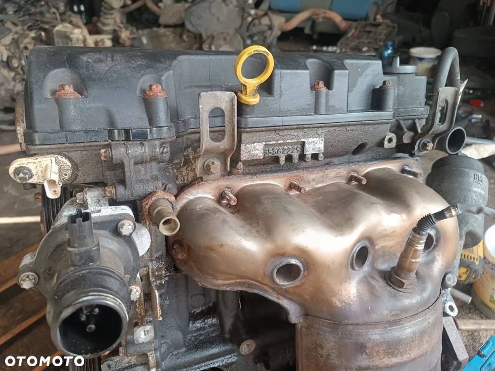 55562229 glowica a12xer b12xer kompletna z wałkami  opel astra iv  j 2011r 1.4 b - 3