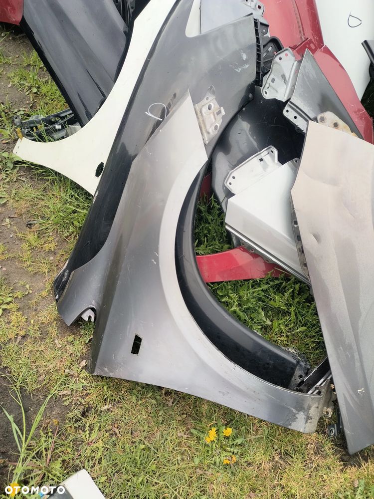 Opel Corsa E błotnik przedni przód prawy
