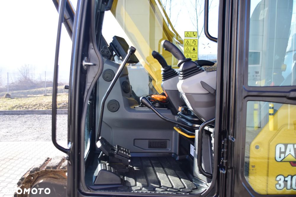 Caterpillar 310 - 17