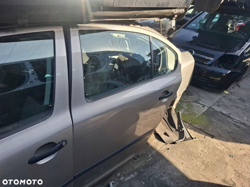 DRZWI LEWE TYŁ TYLNIE SKODA OCTAVIA II 9202 - 1
