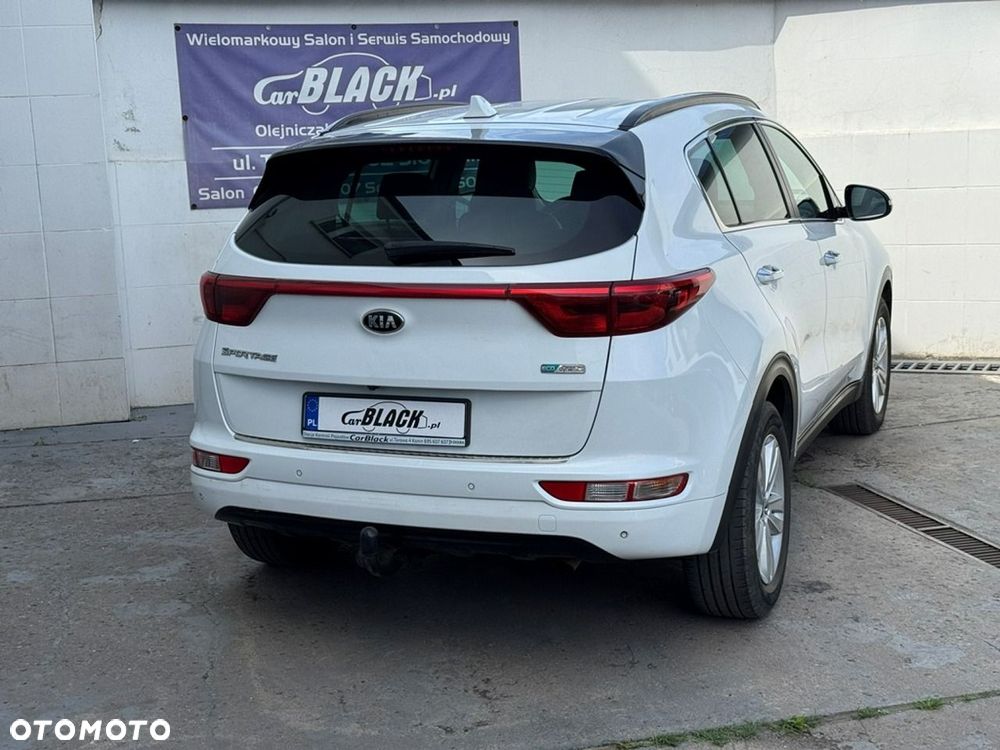 Kia Sportage - 4