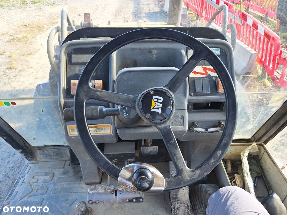 Caterpillar 428 C 4X4 - 12