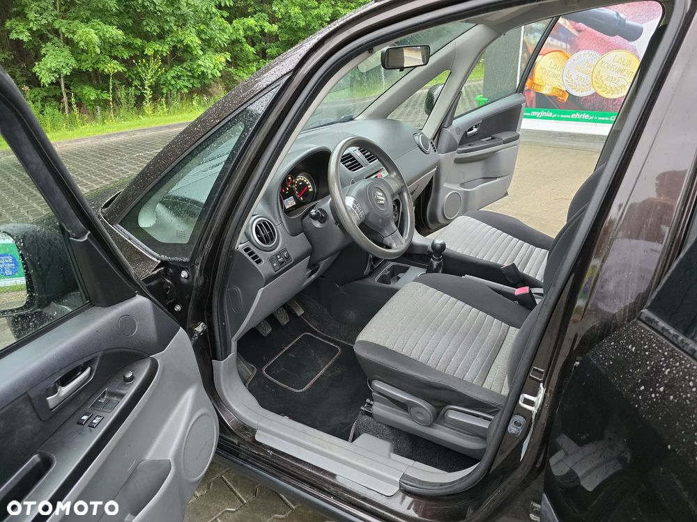 Suzuki SX4 1.6 Comfort Plus - 8