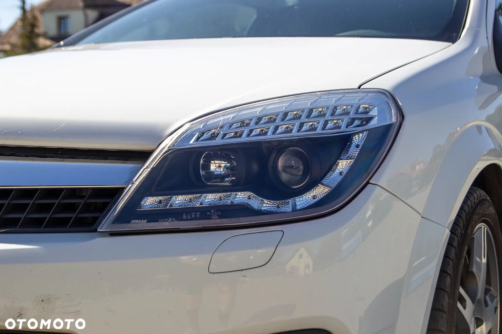 Opel Astra 1.8 Sport - 24
