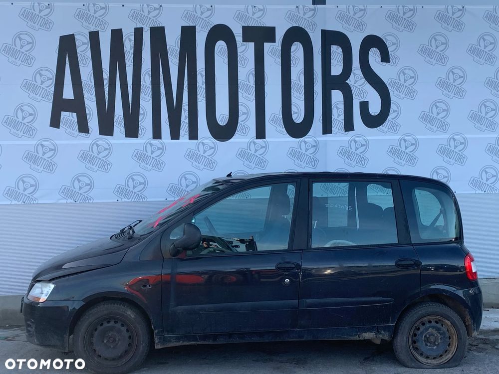 FIAT MULTIPLA 2006 *SAMOCHÓD NA CZĘŚCI* 2917 MASKA, LAMPA, DRZWI, LUSTERKO, ZDERZAK, GRILL, BŁOTNIK, KLAPA, BELKA, DESKA, FOTELE, KANAPA, ĆWIARTKA, KIEROWNICA, TARCZE, ZACISKI, ZAWIESZENIE, KOMPLETNY PRZÓD, KOMPLETNY TYŁ, LICZNIK, ZEGARY, PRAWE LEWE PRZÓD TYŁ - 1