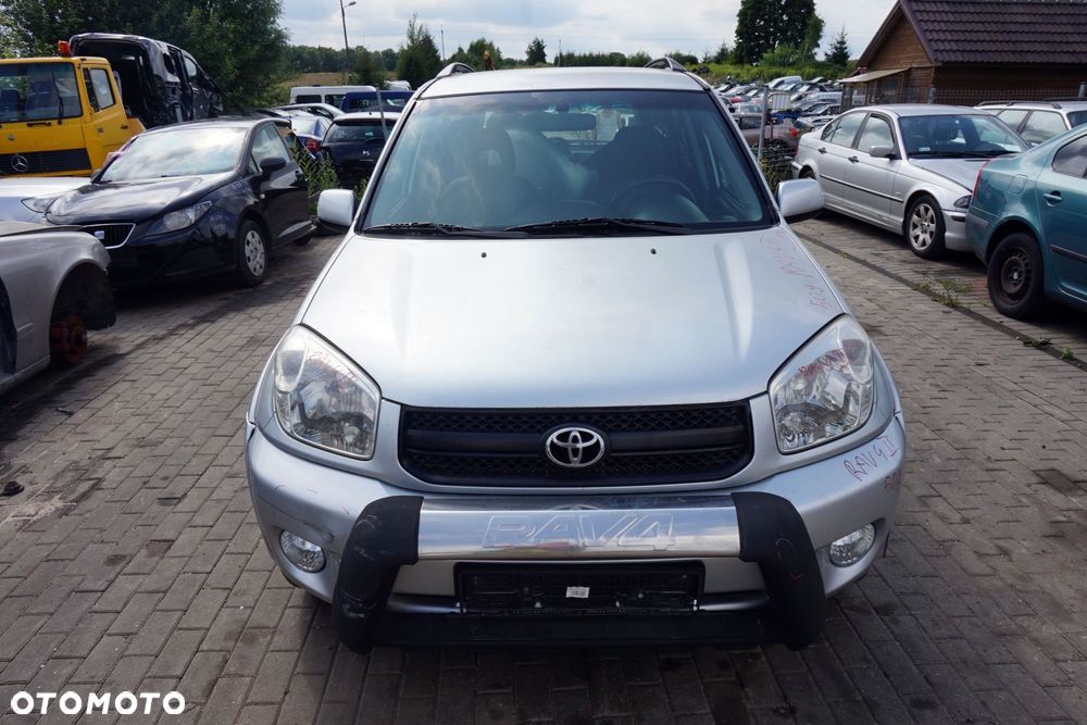 MASKA ZDERZAK BŁOTNIKI LAMPY RAV4 II LIFT 1D4  TOYOTA 2003-2005 SREBRNY PRZÓD KOMPLETNY - 1