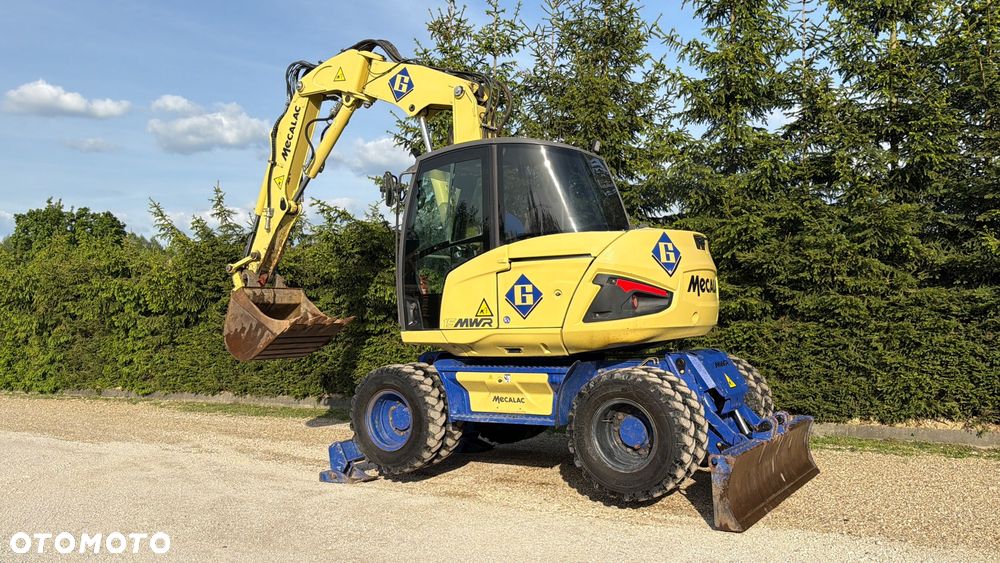 Mecalac Koparka 14 ton MECALAC 15 MWR koparko-ładowarka 3 łyżki widły 1 wł Centr.smarowanie Opony na BLIŹNIAKU 80%Camso ładowarka 714 12MTX 4x4 skrętne KLIMA kabina Premium silnik 146KM volvo EW140B DEUTZ szybka 35km/h - 6