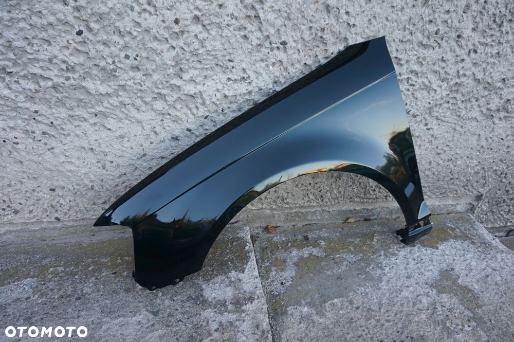 BŁOTNIK PRZEDNI LEWY AUDI A3 8P LIFT LZ6E 08/12r