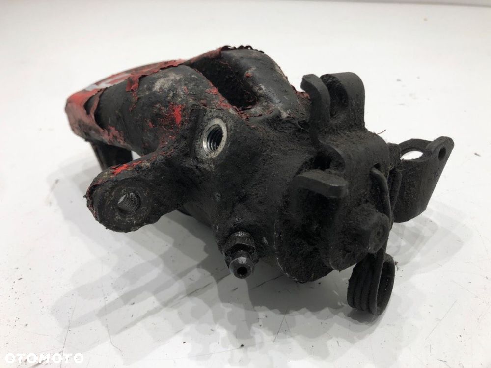 ZACISK PRAWY TYŁ  OPEL ZAFIRA B Nadwozie pełne/minivan (A05) 2005 - 2015 1.9 CDTI VAN (M75) 88 kW - 2