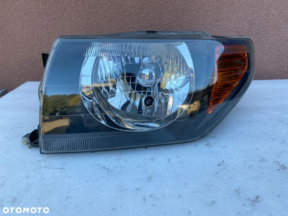 lampa pajero pinin lewa EU cała - 2