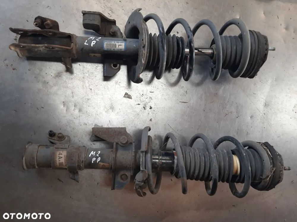 Mazda 2 II amortyzator przedni przód LEWY 1,3 / 1,5 benzyna 2007-14 - 1