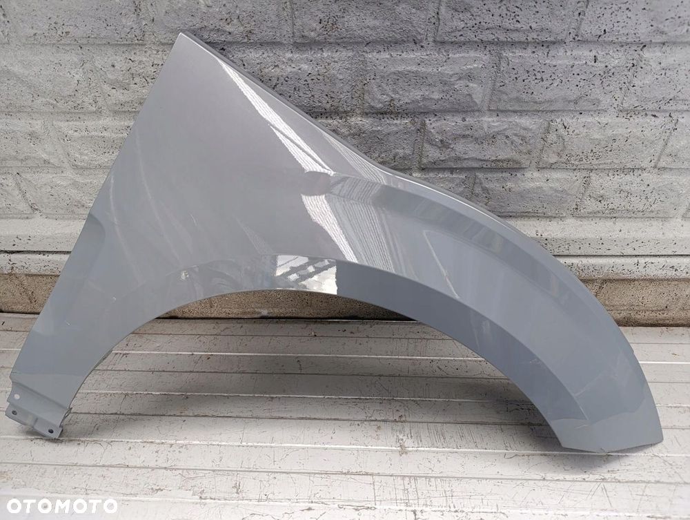 VOLVO EX30 2023- BŁOTNIK PRZEDNI PRAWY ORYGINAŁ