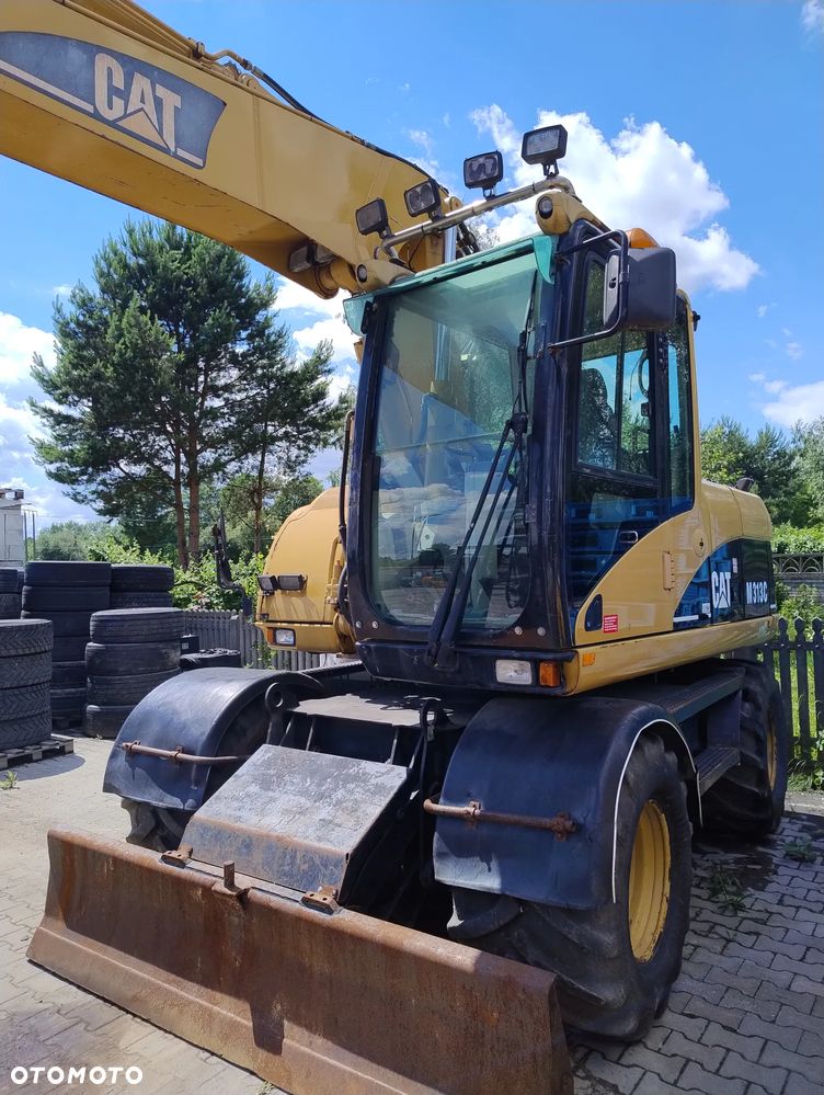 Caterpillar M313C - 9