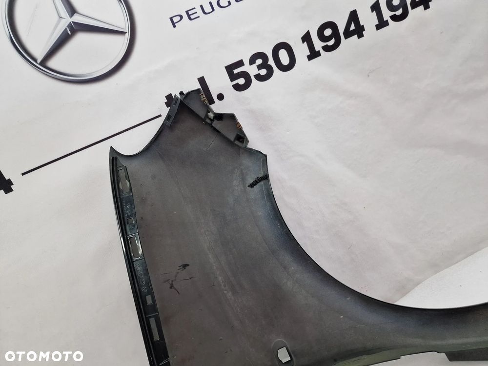 RENAULT TWINGO 3 III 15- LEWY BŁOTNIK PRZEDNI PRZÓD , NR 631013625R , NR AUKCJI BŁ227 - 14