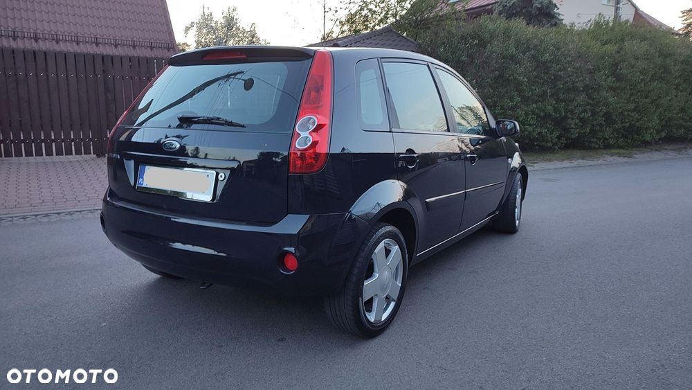 Ford Fiesta 1.4 Ghia - 9