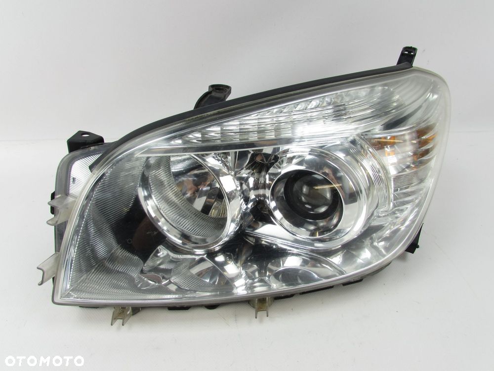 TOYOTA RAV 4 III 05-13 LAMPA REFLEKTOR PRZOD LEWY SOCZEWKA UK - 1
