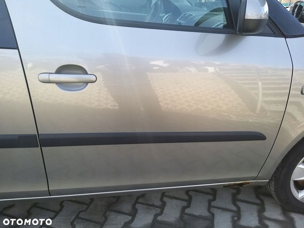 skoda roomster 06-15r drzwi prawe przód europa 9202 - 2