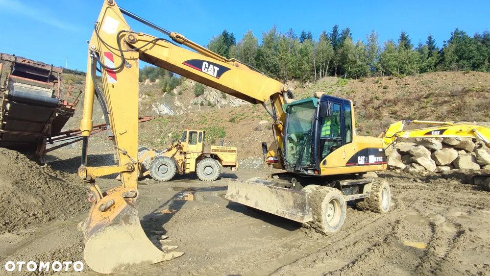 Caterpillar M316C - 1