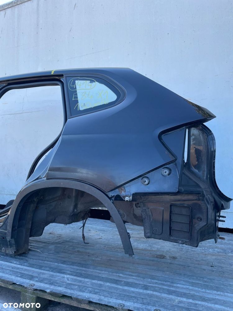 Blotnik poszycie cwiartka szyba listwa lewy tyl 475 475/9 BMW X1 E84 - 4