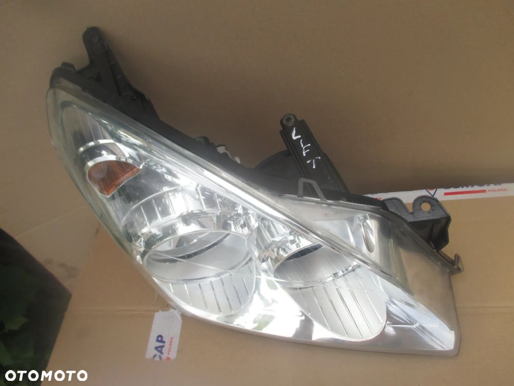 lampa prawa Opel Astra 3 H LIFT Hella Europa - 2