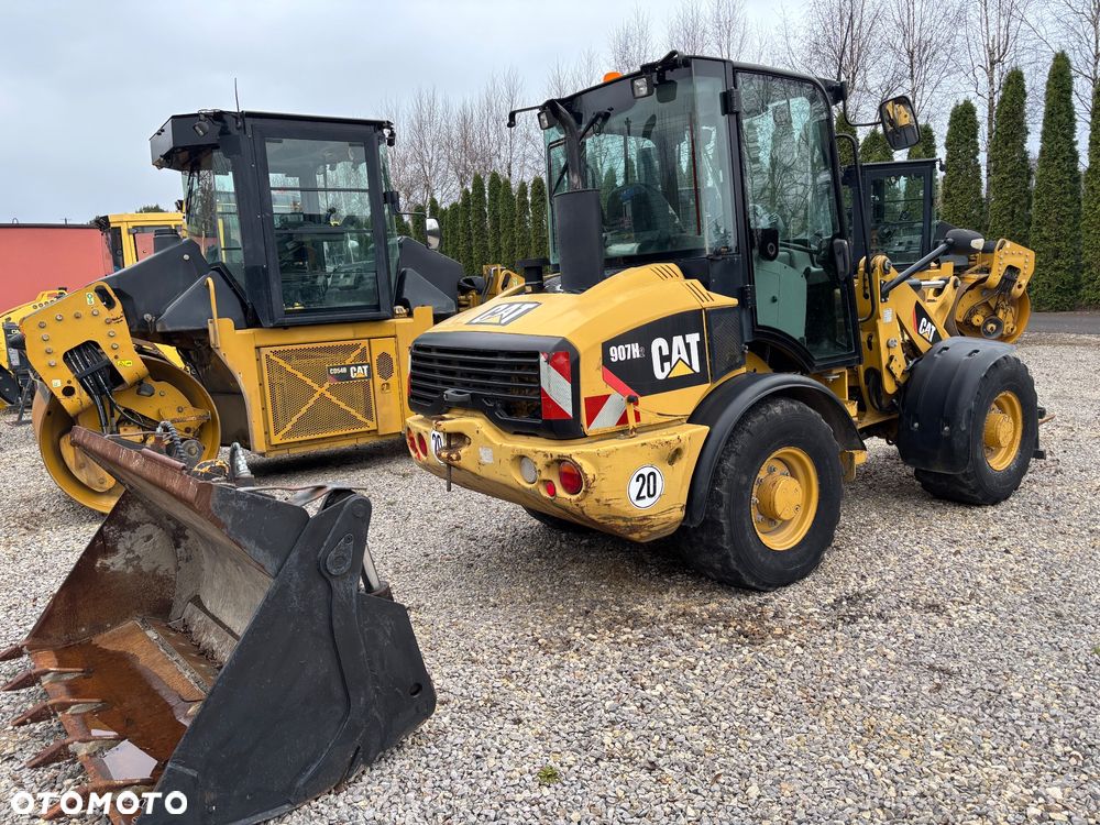Caterpillar 907H2 rekin 4x4 łyzka dzielona z niemiec - 1