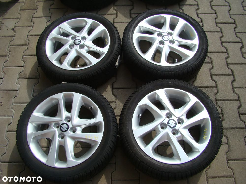 a144 4x100 Suzuki Swift Baleno 6jx16 opony zimowe 195/50 R16 - 1