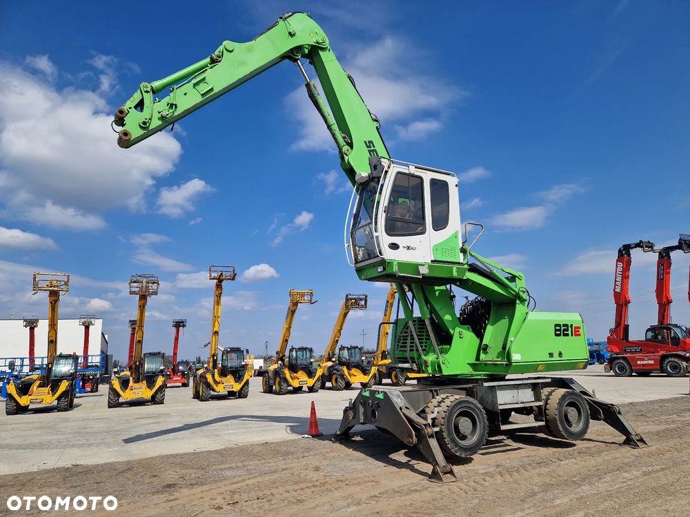 Sennebogen 821E jak FUCHS CAT M500 - 5