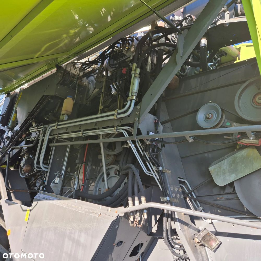 Claas Lexion 650 z hederem - 19
