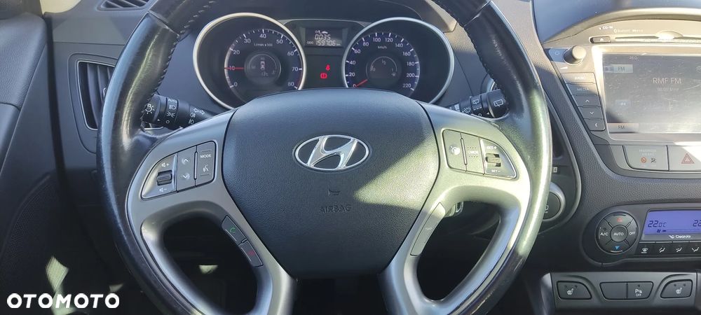 Hyundai ix35 blue 1.6 2WD Finale Gold - 13
