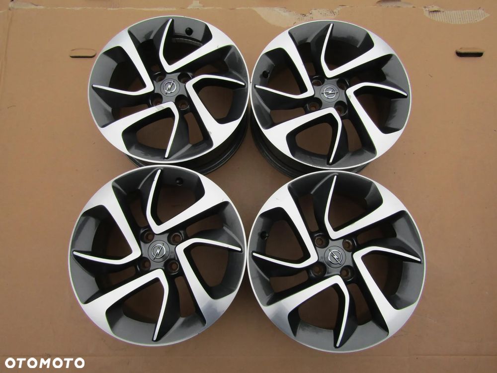 4x Felgi 16 Opel Adam Astra G H Corsa D E Meriva Combo C Karl Fiat Grande Punto Evo 4x100 - 4