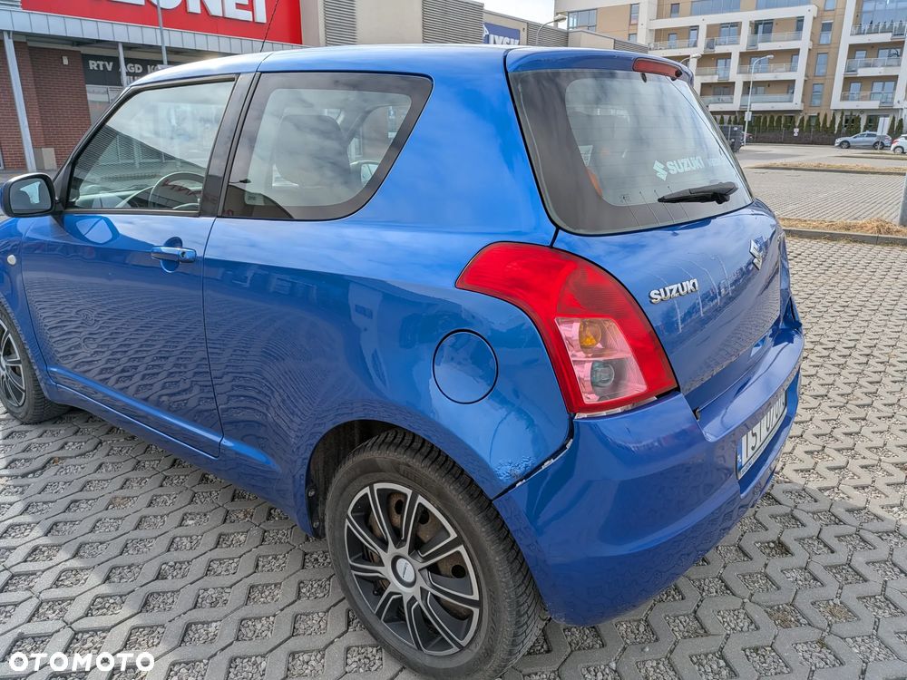Suzuki Swift 1.3 Sakura - 9