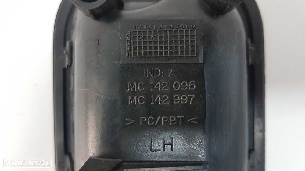 PUXADOR EXTERIOR FRENTE ESQUERDO MITSUBISHI CANTER 01/99 -> PR  35 CABINA INDIVI... - 2