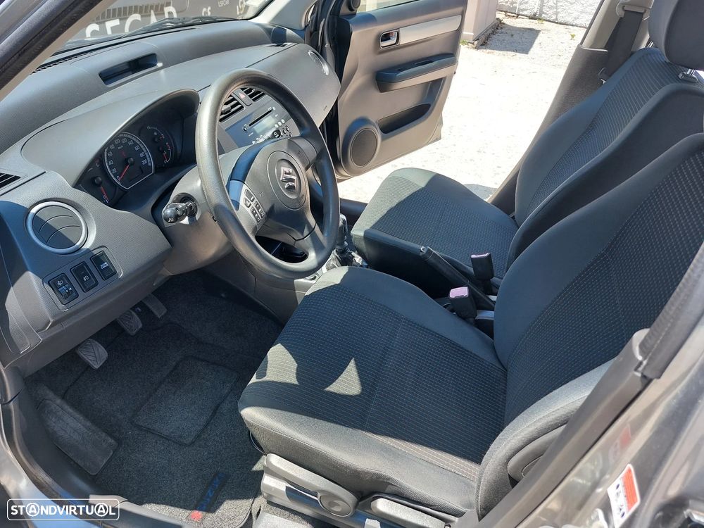 Suzuki Swift 1.3 DDiS GLX - 9