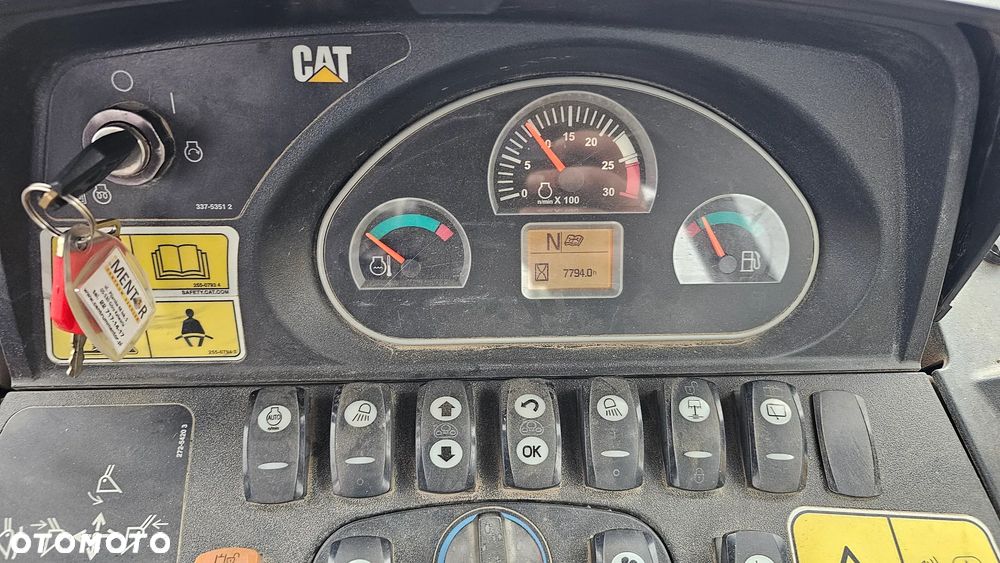 Caterpillar 428E - 6