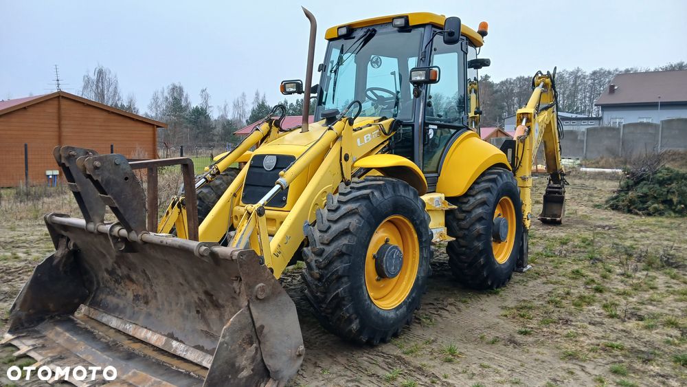 New Holland LB 115 - 8